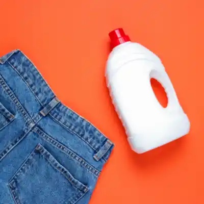 Using Liquid fabric softener to stretch out jeans 