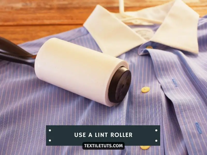 Using a Lint Roller to Prevent Lint on Clothing