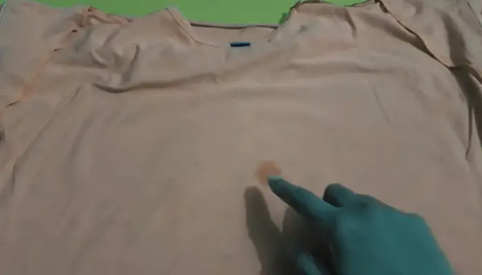 body oil stains on clothes