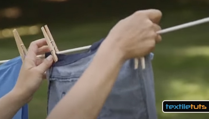 Hang jeans in the Sun to dry