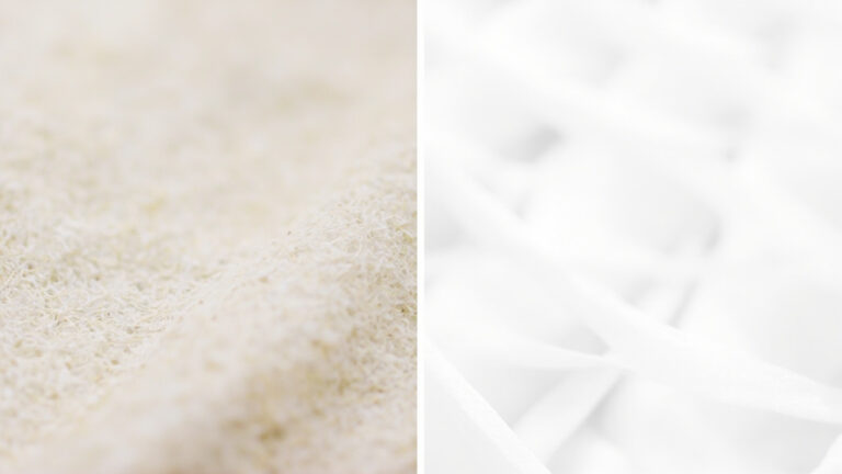 Split macro photograph comparing cotton weave texture on left with irregular natural fibers versus polyester weave on right with uniform synthetic fibers