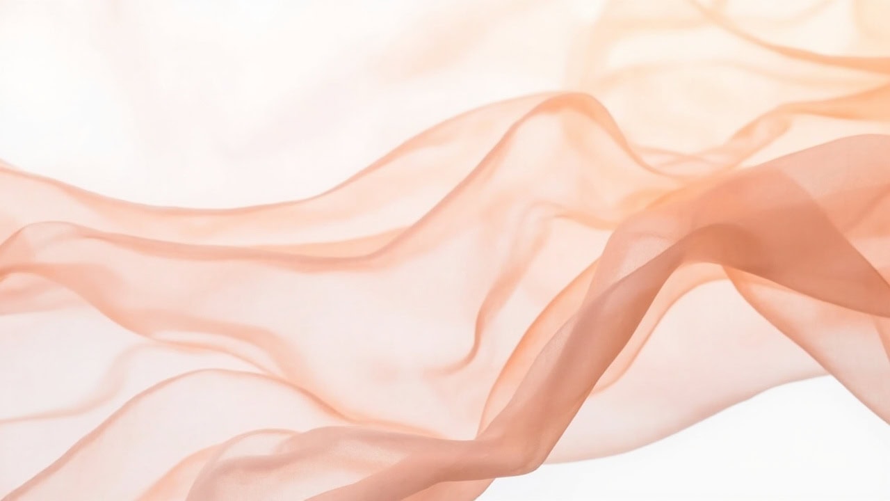 Close-up of rayon fabric showing its silky drape and texture, illustrating its delicate nature