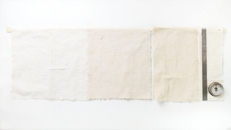 Five fabric swatches showing different GSM weights from 80 to 320 GSM arranged with ruler and scale for comparison