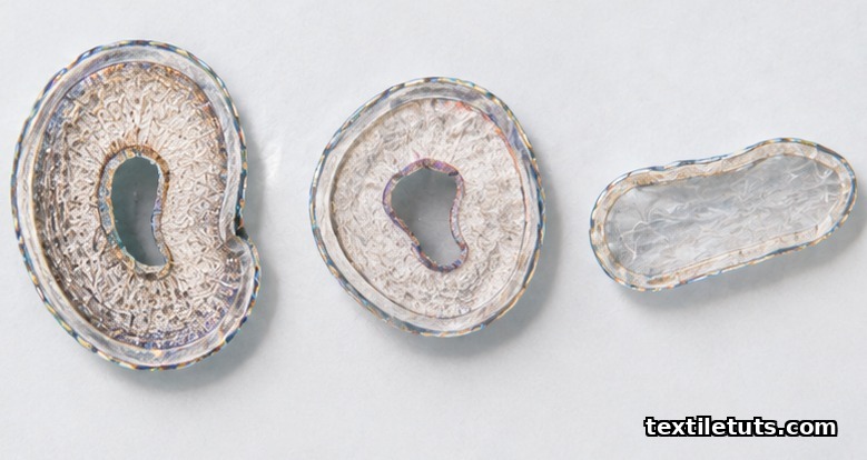 Three cotton fiber cross-sections showing mature, immature, and dead fibers with varying secondary cell wall thickness.